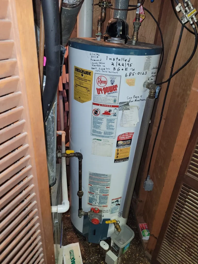 A 31-year-old Rheem Tri-Power water heater installed in 1995 in a Catonsville home