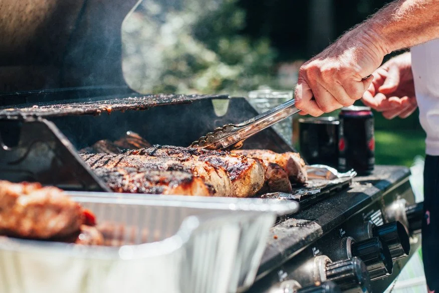 Natural gas line connected to an outdoor grill